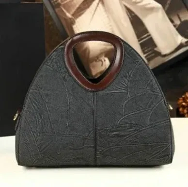 Spliced Geometric Dumpling Handbag
