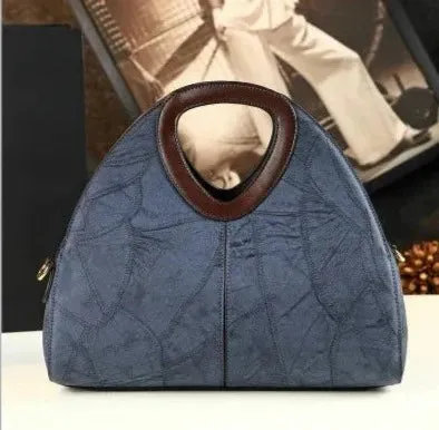 Spliced Geometric Dumpling Handbag