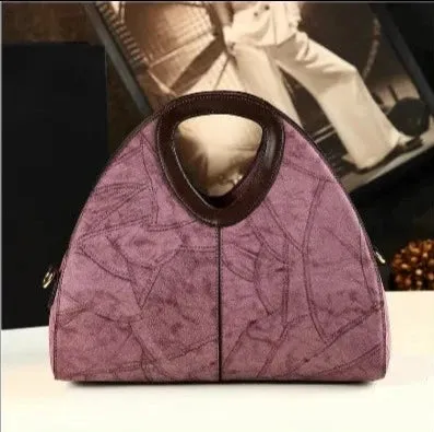 Spliced Geometric Dumpling Handbag